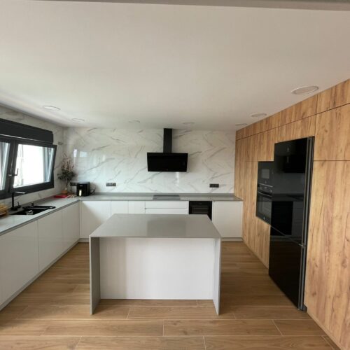 White and wood kitchen with central island