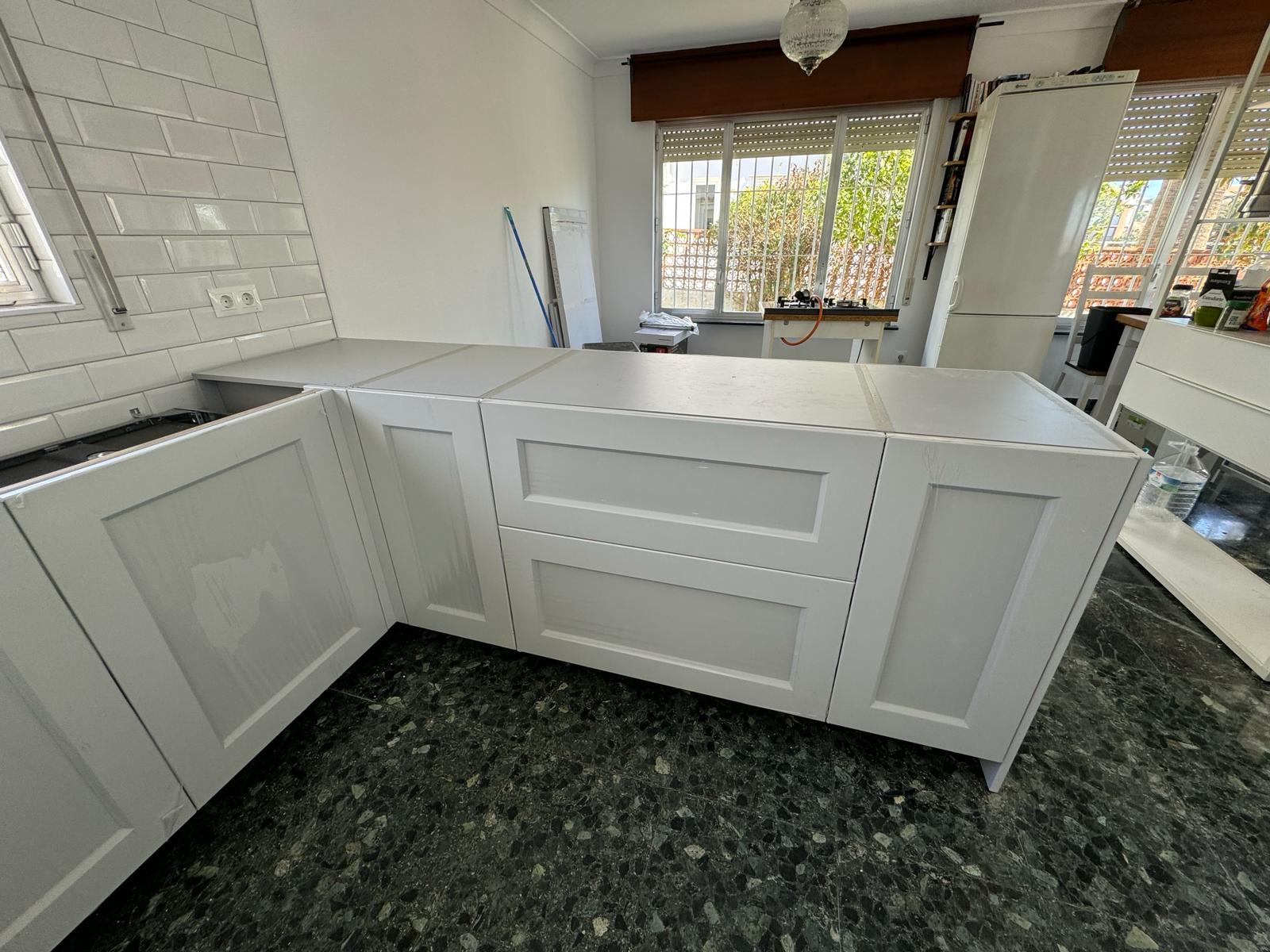 Kitchen with wooden island and earthy color