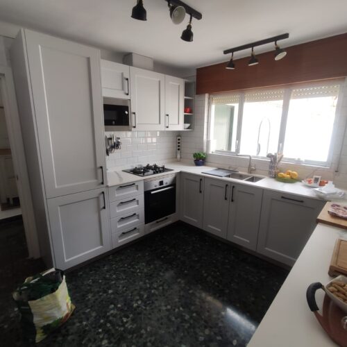 Kitchen with wooden island and earthy color